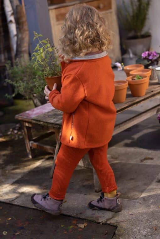 Disana Strick-Leggings aus Merinowolle in orange für Mädchen und Jungen