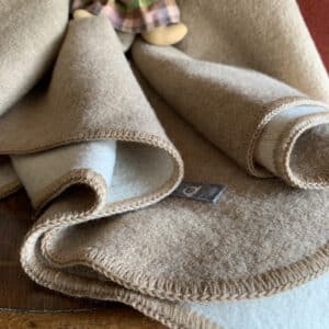 Bio-Kinderdecke aus Merinowolle von Disana in natur-beige