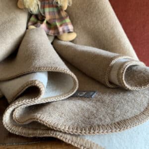 Bio-Kinderdecke aus Merinowolle von Disana in natur-beige