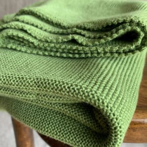 Grüne Babydecke aus Bio-Merinowolle